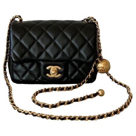 small chanel black purse|Chanel small bag with chain.